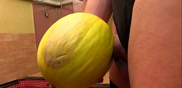  Shemale Amanda Fialho fucks a melon